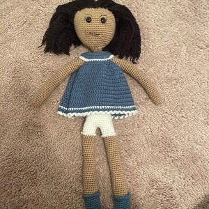 Handmade knitted doll